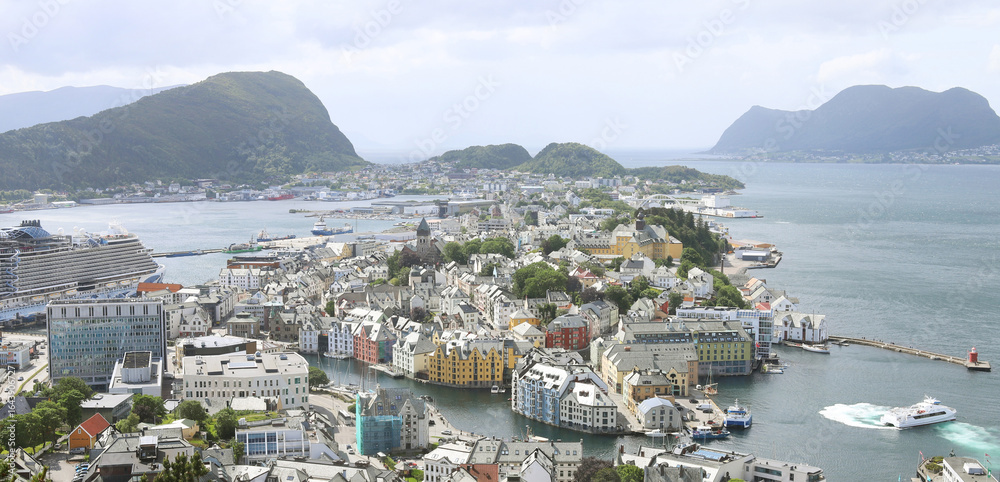 Fototapeta premium Alesund, Norway - amazing panoramic view. Aerial view from the mountain Aksla to city island, ocean and mountains.