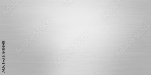 Brushed metal texture background with silver metallic plate and shiny surface