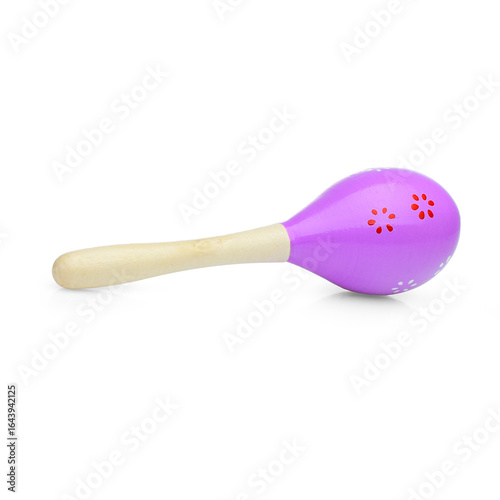 Purple wooden maracas on a white background. Children's musical rattle for games.