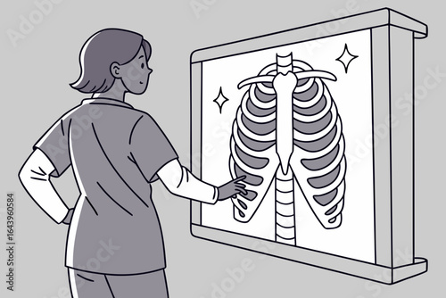 Doctor examining a chest x ray of human rib cage isolated on white background