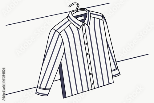 Striped button down shirt hanging on a hanger isolated on white background