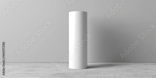 Tall, white cylinder standing on a light grey floor against a plain white wall