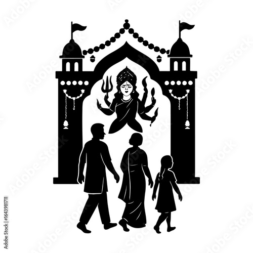 Family walking towards a temple gate with a depiction of goddess durga