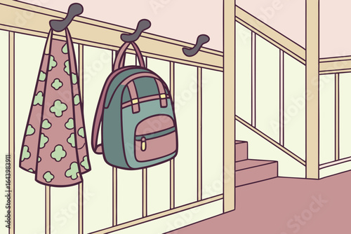Children’s backpacks hanging on pegs in a hallway, selective focus on the one with patterns.