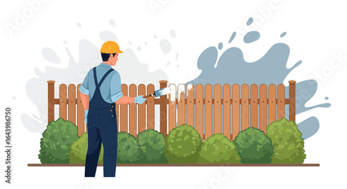 A maintenance worker expertly paints a wooden fence with white paint in a residential area landscape for upkeep and beauty