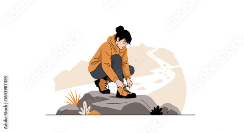 A woman is tying her shoelaces on a rock, preparing for a hiking adventure