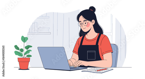 Young woman working on her laptop at a desk with a plant and books in the background