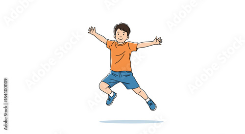 Energetic young boy leaping with outstretched arms celebrating joyous childhood fun and excitement
