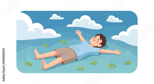 Boy lying on the grass under a cloudy sky enjoying nature and relaxation concept