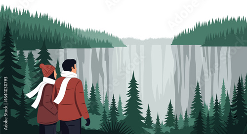 Couple enjoying the scenic view of a waterfall and forest in a winter landscape
