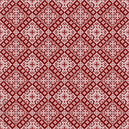 Luxurious damask pattern on a rich red background, featuring elegant floral and ornamental details with a timeless classic style. Ideal for upscale home décor, fashion textiles.