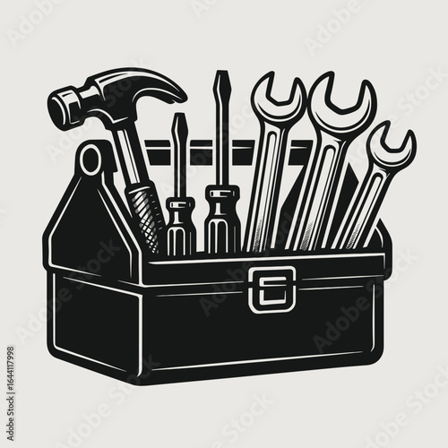 Classic tool box filled with various tools on light background