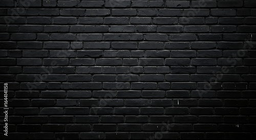 Photo of dark black brick wall texture for background use