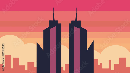 twin towers catching pink orange hues of early sunrise