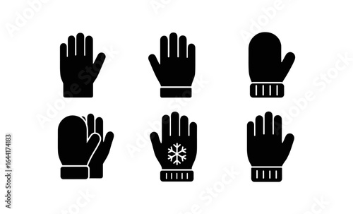 Silhouette set of winter gloves and mittens with snowflake design
