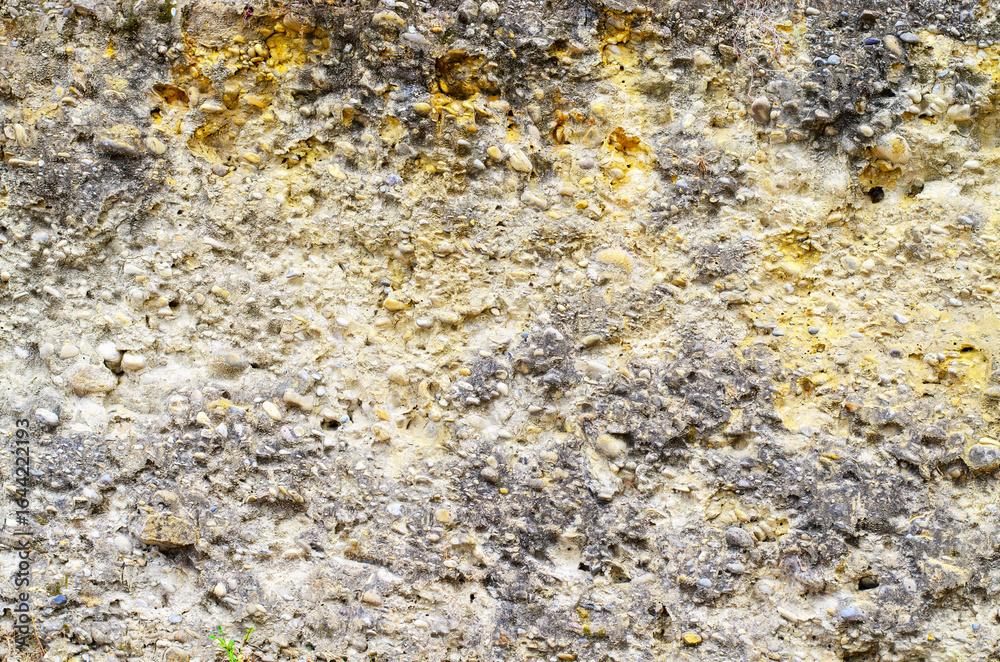 Fototapeta premium rough texture of stone and sand wall creating unique natural background