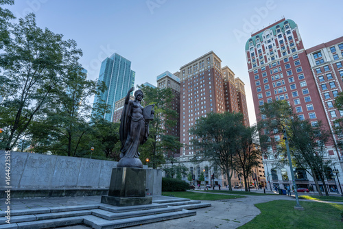 park with statue of woman in downtown Chicago