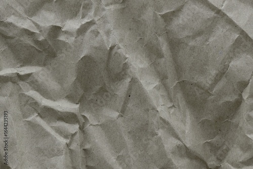 Brown crumpled recycled paper texture background. Kraft Paper