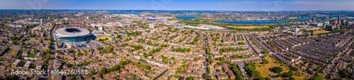 Photography Aerial view of Tottenham Hotspur Stadium in London, showcasing its modern archit