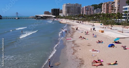 Aerial Bird's eye view of Albanian city Durres. Buildings and beach along Adriatic sea coast.