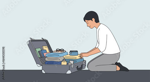 Suitcase packing preparation for summer vacation trip. Person kneeling packs clothes and personal items into gray suitcase.  Summer travel concept for blogs and travel agencies advertising.