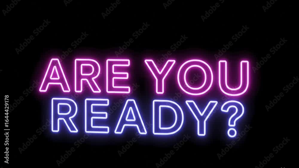 Dynamic blue neon sign flashes ARE YOU READY? creating excitement and anticipation for an upcoming event or challenge. Dynamic blue neon sign flashes ARE YOU READY? creating excitement and anticipation for an upcoming event or challenge.
