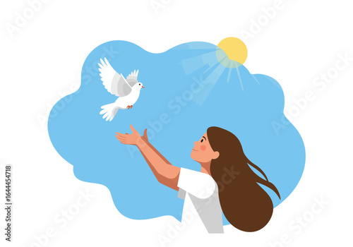 Girl releasing a white dove into a sunny sky.