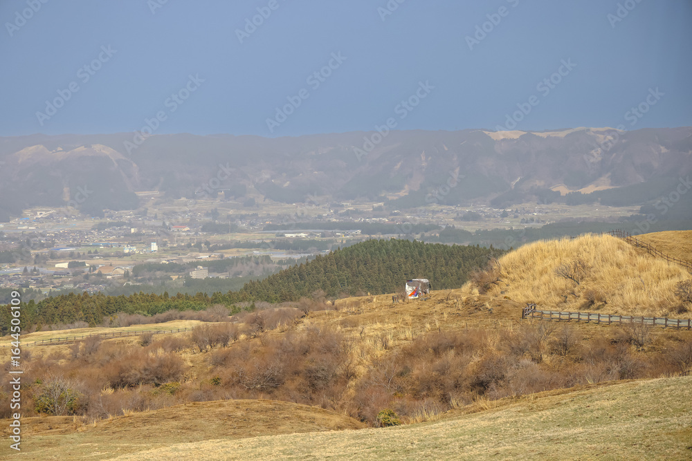 Fototapeta premium March 25 2025 Scenic Landscape with Vast Sky and Peaceful Countryside Fields, Japan