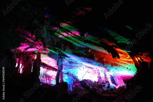 Photos Vibrant colors illuminate the cave formations, highlighting the beauty of Penn's Cave near Centre Hall, Pennsylvania, U
