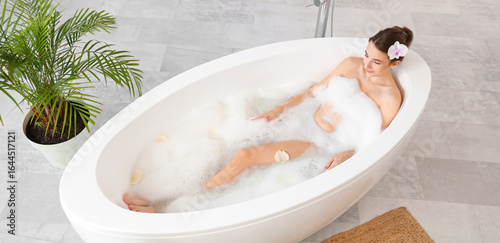 Beautiful woman relaxing in...