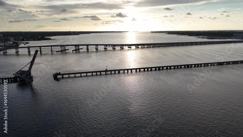 Wallpaper Mural aerial flying backward away from the bridges across the Manatee River in Bradenton, Florida at the end of a warm summer day Torontodigital.ca