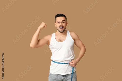 Handsome sporty shocked man...