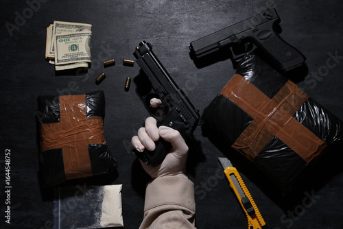 Man with guns, money and dr...