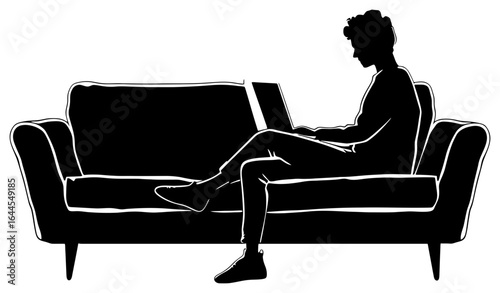 silhouette of remote worker on laptop sitting on sofa