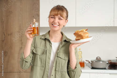 Young woman with sweet hone...