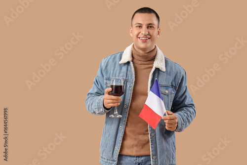 Young man with French flag ...
