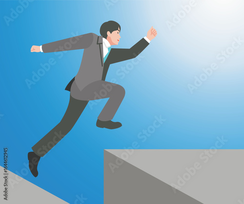 飛び越えるビジネスマン