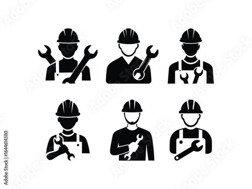 Vector silhouette of a construction worker wearing safety helmet and holding a wrench