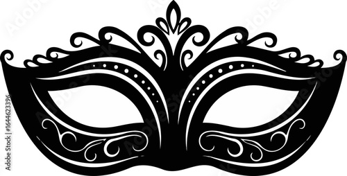 An ornate black masquerade mask with swirls and dots for a costume ball or mardi gras celebration