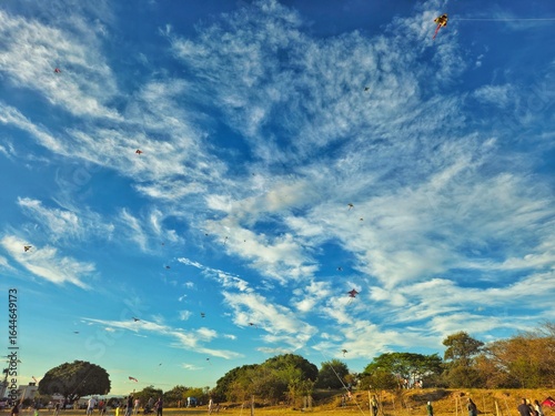 landscape with blue sky and clouds and cometas