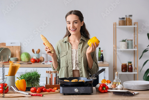 Young woman with vegetables...