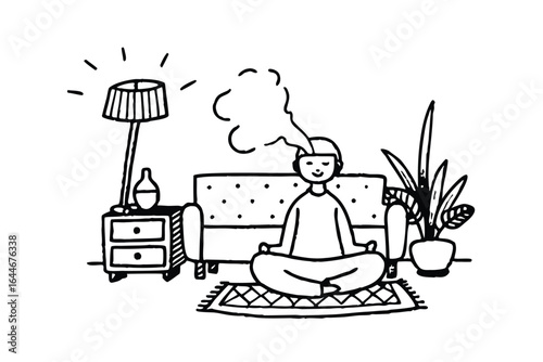 Man relaxing in a modern living room with artwork and essential oil diffuser