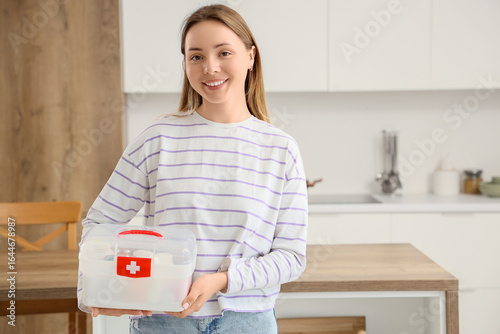 Young woman with first aid ...