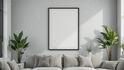 A1 black metal frame poster, mounted on a light grey wall, contemporary living room with plants