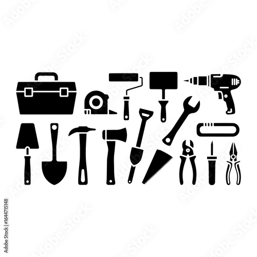 Assorted black construction tools and toolbox tape measure