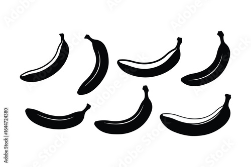 Seven black banana silhouettes arranged on a white background fruit
