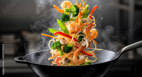 Fototapeta Naklejka Na Ścianę i Meble -  Flying Stir-Fry: Shrimp, Noodles, and Vegetables in Motion