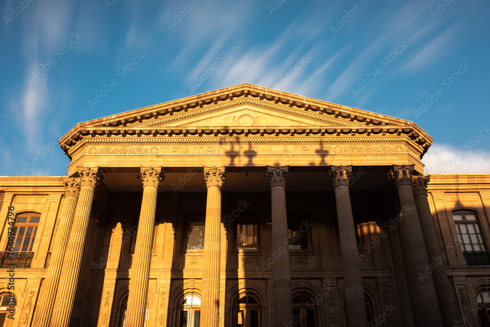 Obraz premium Detailed exterior and facade of the iconic Teatro de la Paz in San Luis Potosí, Mexico. Captured in morning light under a clear sky