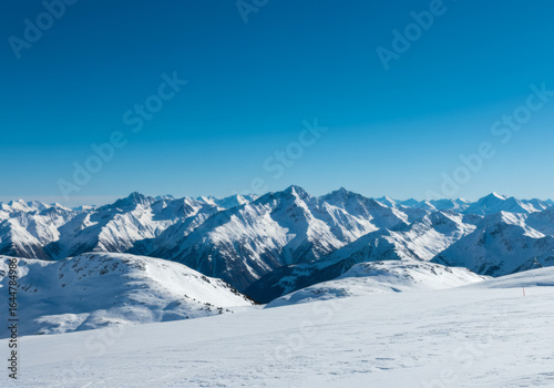 Winter's Embrace Snow-Capped Mountains Under Azure Skies, a landscape  in the snow