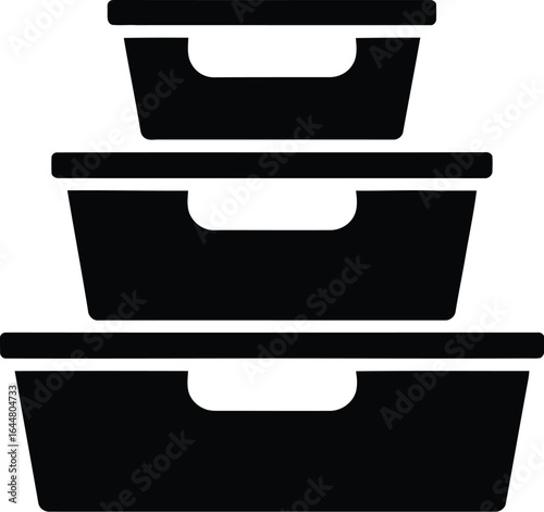 Stack of three black food storage containers with lids on white background